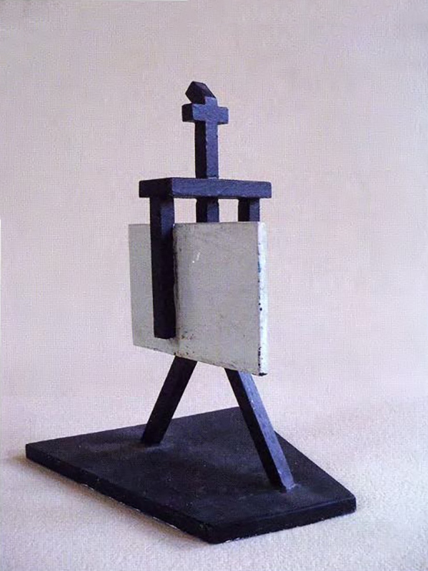 Игорь Шелковский. "Художник с картиной", 2002. Дерево, краска, 28х18х15 см.  Фото: каталог "Игорь Шелковский", Мультимедийный комплекс актуальных искусств, М., 2013